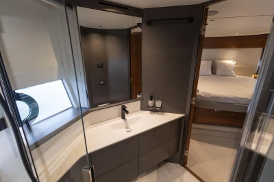 Luxurious bathroom and bedroom interior of 2025 Princess S65 yacht.